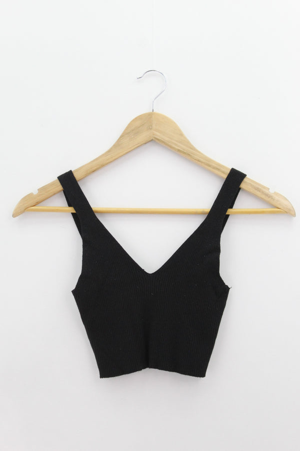 TOP Femenino BASICO SIN MANGA Bershka
