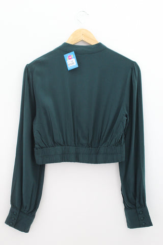 TOP Femenino BASICO CON MANGA Forever 21