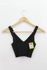 TOP Femenino BASICO SIN MANGA Bershka
