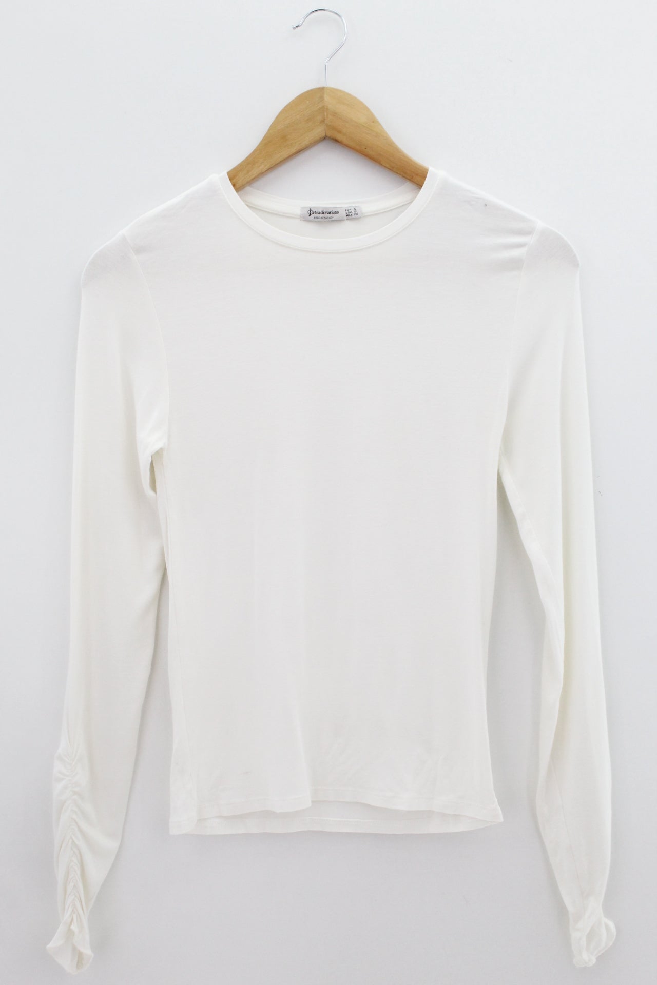 TOP Femenino BASICO CON MANGA Stradivarius