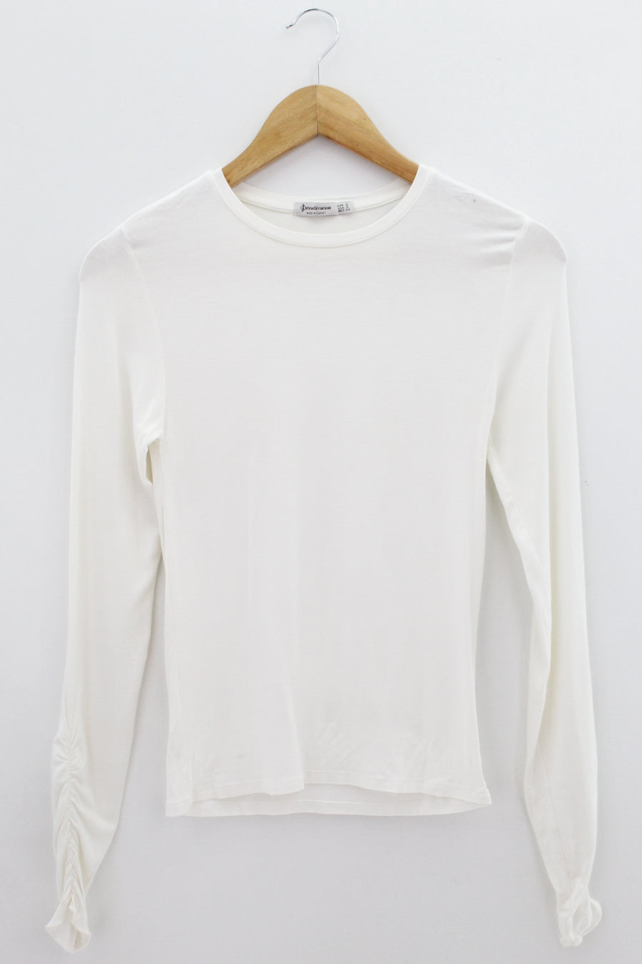 TOP Femenino BASICO CON MANGA Stradivarius