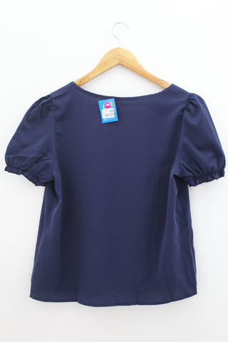 TOP Femenino BASICO CON MANGA Shein